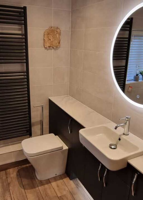 After photos - Integrated sink and toilet installation with wall mounted LED light mirror After photos - Integrated sink and toilet installation with wall mounted LED light mirror