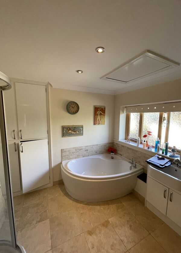 Before photos - Bulky bath in a dated bathroom Before photos - Bulky bath in a dated bathroom